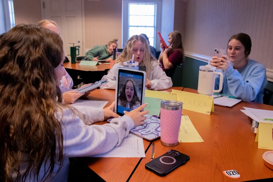 Future teachers in Robin Fuxa's class at Oklahoma State University record their mouth shapes while forming words.