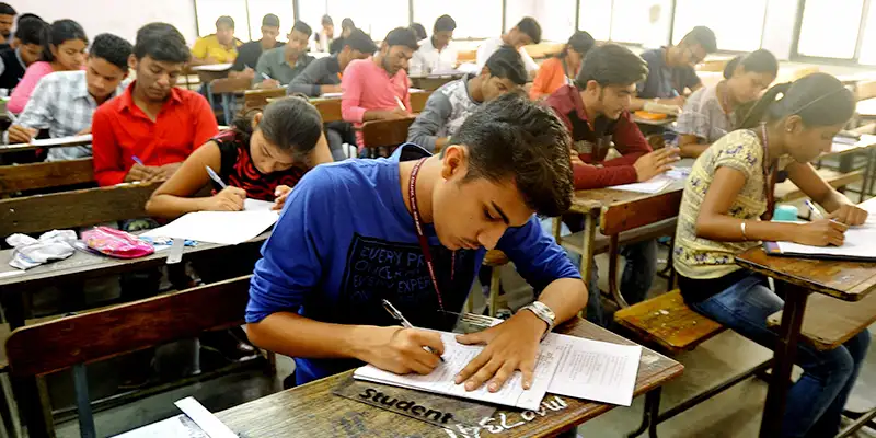 e71fdb0d683844515f898a80ef3a170dCollege-students-exam-for-portal.webp